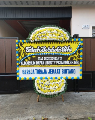 Papan Bunga Duka di Medan Kota